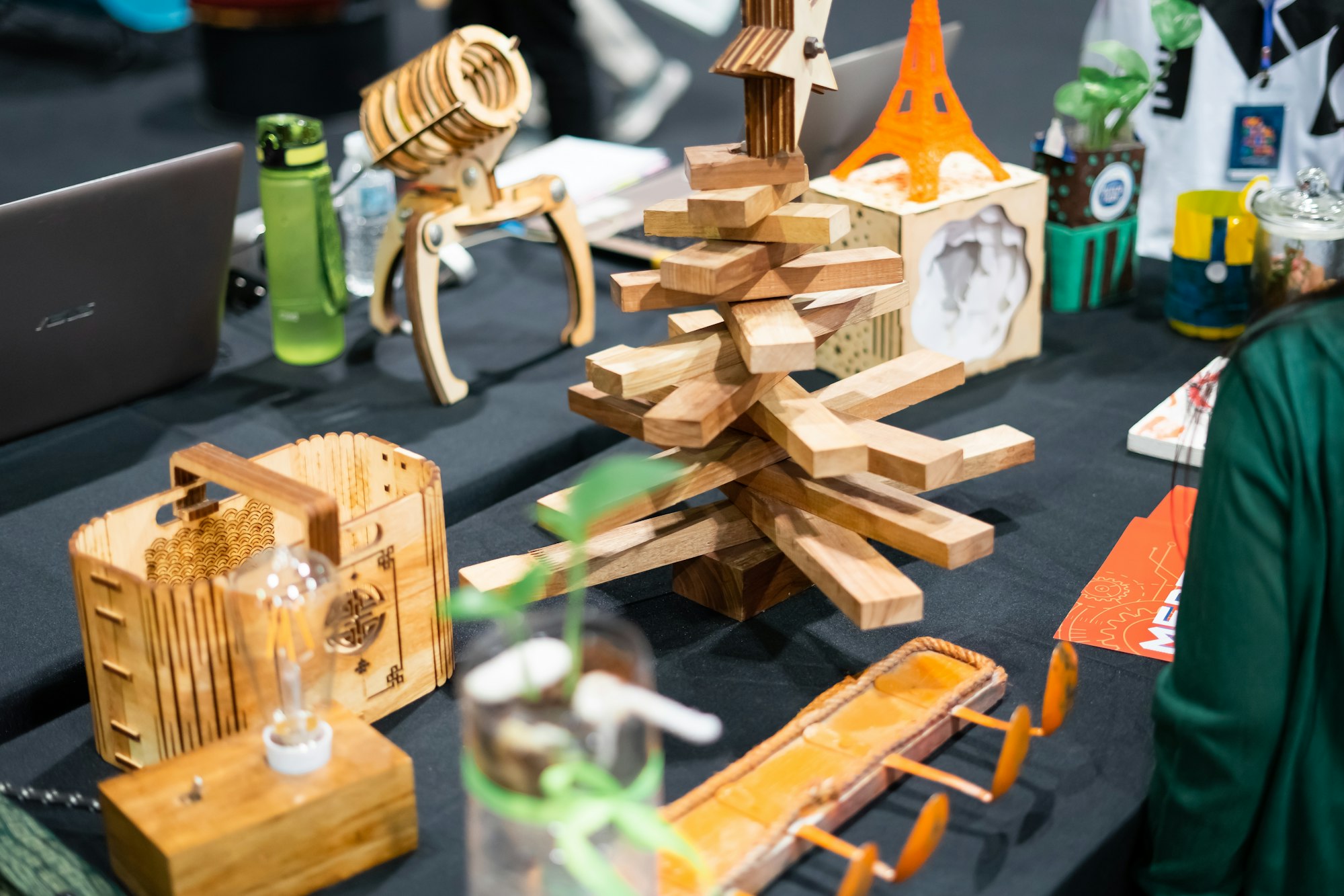 toys from woods on display at a educational fair